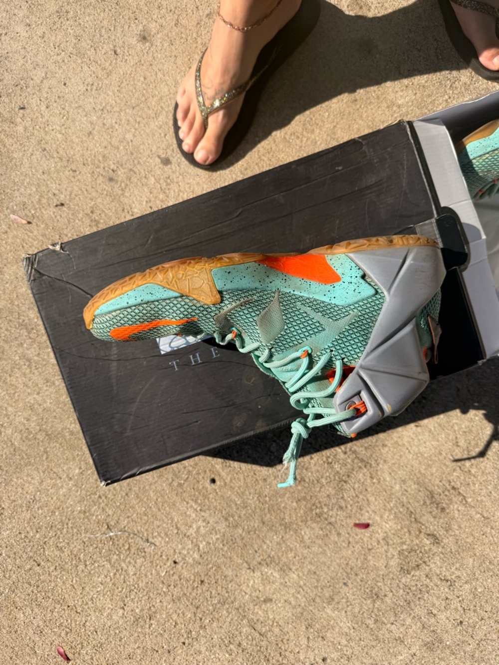 Lebron XII Mint Green Athletic Sneakers with Orange Accents